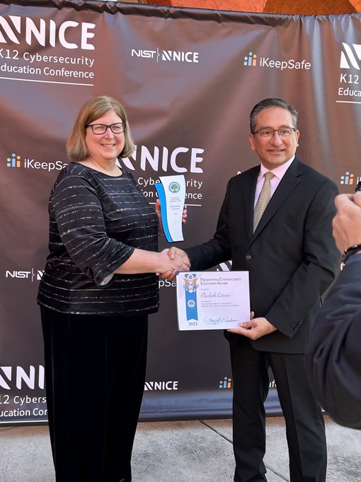 Beth Cerrone receiving the Presidential Cybersecurity Education Award