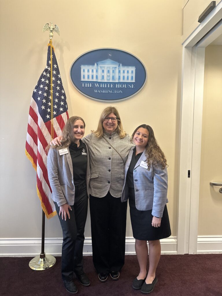 Silver Creek High School senior Kaylee Crouthamel and Niwot High 2024 graduate and current Colorado State University student, Sienna Arellano pose with Innovation Center Teacher, Beth Cerrone at the White House. 
